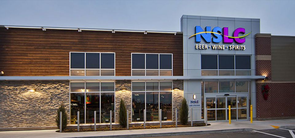 Empty NSLC storefront at dusk closed earlier due to new COVID-19 regulations.