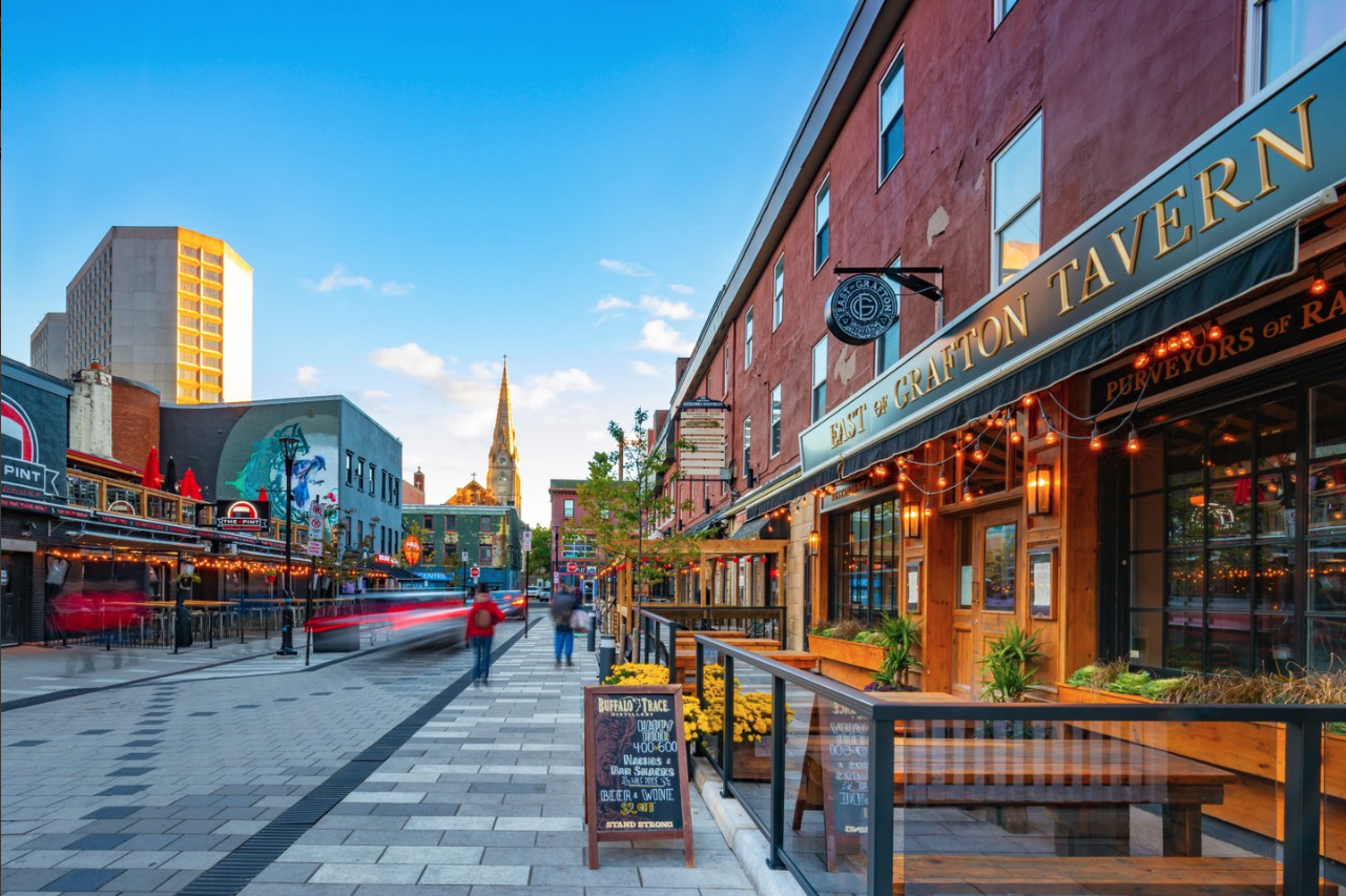 Sunsetting on Halifax's Argyle Street in the downtown core, normally packed with people, shown here empty and struggling